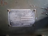 a sign on the side of a machine that says steam industries