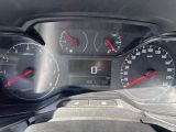 a close up of a car dashboard with a speedometer and gauges