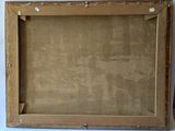 an old wooden frame with a picture hanging on the wall