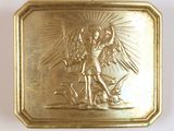 une image représentant une boîte en métal doré sur laquelle figure l'image d'un ange