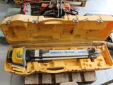 a tool in a case that is sitting on a pallet