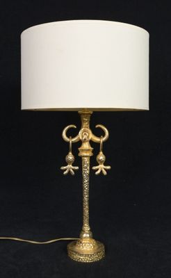 an image of a lamp with a white shade on a black background