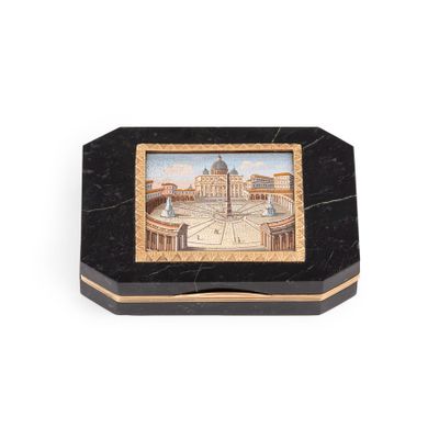 a picture of a black and gold box with a picture of a building