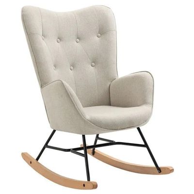 un fauteuil à bascule blanc aux pieds noirs et à l'assise rembourrée beige