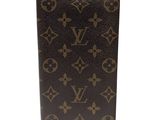 étui à passeport en cuir Monogramme Louis Vuitton