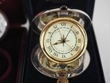 a clock that is sitting inside of a box