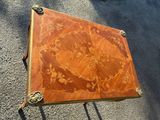 an image of a wooden table with a decorative design on it
