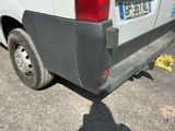 a white van parked on the side of the road