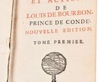 an open book with a drawing of a key on the cover