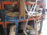 a large amount of items on the shelves in the warehouse