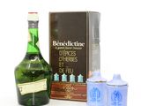 bottle of benedicine d ' orches d ' herbes and two shot glasses
