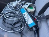 a car seat with a bunch of wires attached to it