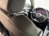 a close up of a car ' s dashboard and steering wheel