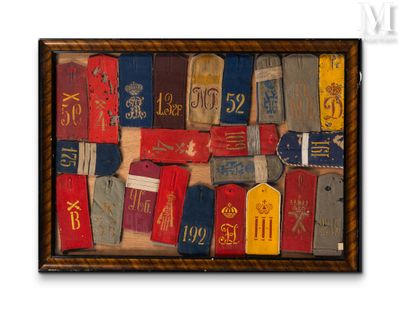 a picture of a picture of old luggage tags on a wall
