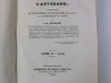 an open book with a black and white title on it