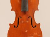 an old violin with a bow hanging from it ' s back