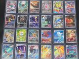 the pokemon trading card collection is displayed on a table