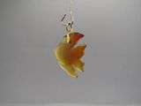 yellow and orange glass leaf earrings hanging from a gold plated earwire