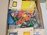 a box of assorted items sitting on a table