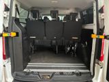 a white van with four black seats in the back of it