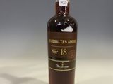 an image of a bottle of whiskey sitting on top of a table