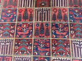 an oriental rug with a red and blue design on it