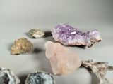 many different types of rocks and stones on the table
