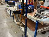 une photo d'un établi sur lequel est posé un ventilateur