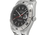 a close up of a wrist watch on a white background