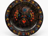 une image représentant une assiette décorative ornée d'un motif