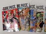 a lot of comic books on the table together