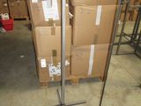 a metal pole that has a bunch of boxes on top of it