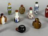 a lot of small vases that are sitting on a table