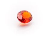 a red and orange diamond on a white surface