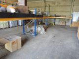a large room with a lot of boxes and boxes on the floor