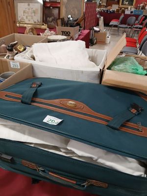 a suitcase sitting on top of a table in a room