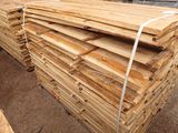 many pieces of wood stacked on top of each other
