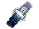 a close up of a watch on a white surface