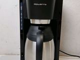 a coffee maker that is sitting on a counter