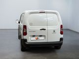a white van that is parked in a room