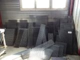 many pieces of metal in a room with a window