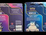 two boxes of pokemon toys are shown on a black background