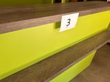 a yellow and brown counter with a number on it
