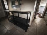 an image of a room with a table and a mirror