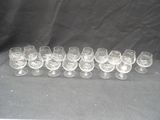 a lot of empty wine glasses sitting on a table