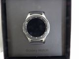 a watch that is in a box on the table