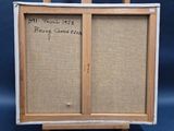 an old picture of a painting on a easel with a piece of paper on it