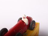 a toy car that is sitting on top of a box