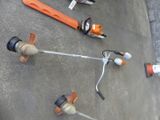 many tools that are laying out on the ground