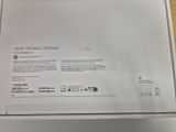 the back of a white box with a picture of a laptop on top of it